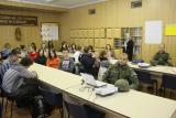 Príslušníci HQ ISAF robia prednášku v miestnej škole